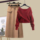 Red sweater and brown skirt