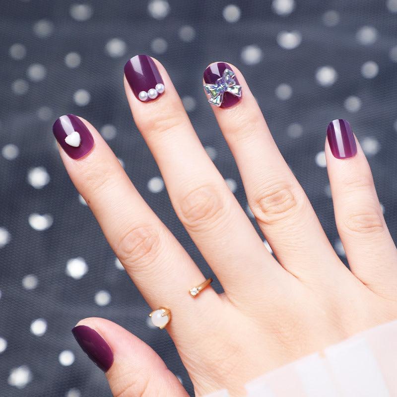 Wearing Nails With Diamonds And Purple Fake Nails - MAXIME